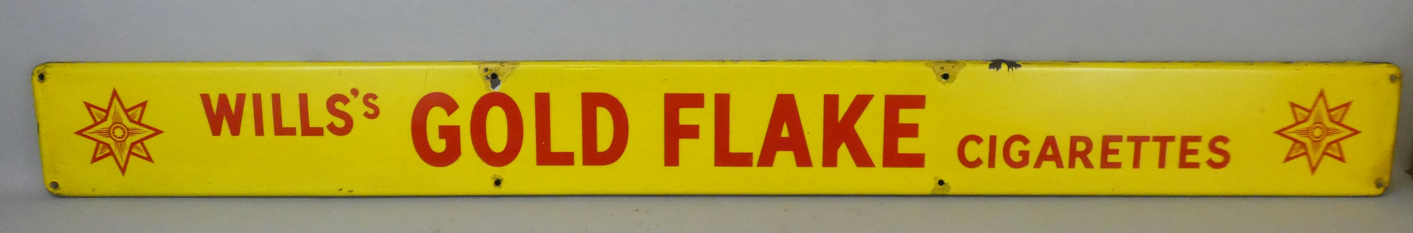 A vintage enamel single sided wall mounted sign for Wills's Gold Flake Cigarettes, 15.5 x 152cm.