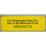 An enamel sign 'For Passengers' Use Only Not To Be Removed From BRIDLINGTON', 18 x 52cm.