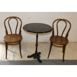 A circular wooden topped cast iron table, together with two Bentwood chairs, diameter 61cm, height