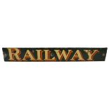 A vintage dark green enamel sign 'Railway', with tango, maroon and beige lettering, 13 x 90cm.