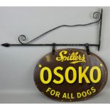 A vintage enamel double sided swinging sign for Spillers Osoko, on original iron hanging bracket,