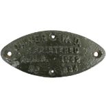 A wagon plate 'Owner W.D. Registered L.M.S. 1942 No. 634', 22 x 10cm.