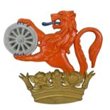 A reproduction British Railways 'Lion-holding-Wheel' painted alloy crest, cast to the reverse