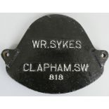 A wagon plate 'WR Sykes Clapham. SW, 818', 21 x 26cm.