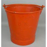 A British Rail red painted metal fire bucket, with colander base, height 29cm.