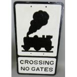 A reproduction aluminium motoring road sign 'Crossing No Gates', 52 x 30cm.