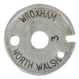 An aluminium single line tablet, Wroxham North Walsham, No. 3, diameter 11cm.