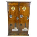 An oak counter top vending machine for Player's Navy Cut cigarettes, manufactured by Clement,