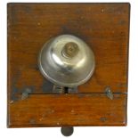 A mahogany cased block bell with cow bell and tapper to front, case 25 x 23cm, height 26cm.