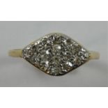 An 18ct gold diamond set panel ring, set with single cut stones, size N.
