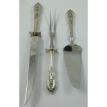 A sterling silver handled carving knife, fork and pastry slice, stamped Sterling Silver, unused,