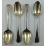 A George III silver set of four Old English pattern table spoons, London 1786, with bright cut