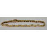 A 9ct gold diamond set bracelet, set with brilliant cut stones, length 19 cm, weight 9 gms.