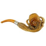 A Meerschaum pipe with amber stem, the bowl depicting a bird of prey's claw clutching an egg, 16 cm,