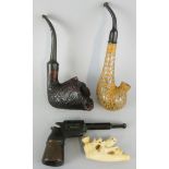 A briar pipe, in the form of a shell, signed Astleys, 109 Jermyn St, London, a novelty pipe in the