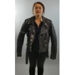 A late 1970's/early 1980's leather heavy metal/punk biker style jacket, label Cuir Veritablb. size