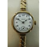 Rolex, a 9ct gold ladies manual wind wristwatch, Glasgow 1929, the white dial with subsidiary