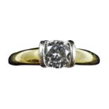 An 18ct gold single stone diamond ring, set with a brilliant cut diamond, stated weight 0.67 cts,