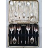 A Victorian silver set of six tea spoons and tongs, Sheffield 1897, with floral engraved decoration,