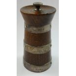 A silver and oak pepper grinder, by Hukin & Heath, Birmingham 1912, of milk churn form, height 9.5