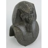 A 20th century black glass Tutankhamun bust, with signature to base, 10 cm.