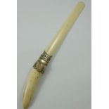 A Victorian silver and ivory page turner, London 1887, with plain blade, length 45 cm.