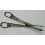 A Victorian silver pair of grape scissors, by George Adams, London 1869, with shell, gadroon and