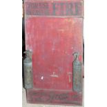 A vintage painted wood advertising board for Pyrene Fire Extinguishers, mounted with two small