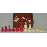 A late 19th/early 20th century Cantonese bone chess set, one side stained red, one knight a