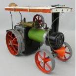 A Mamod live steam showman's engine TE1, with burner and steering stick.