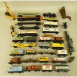 A collection of assorted railway wagons and accessories to include a Hornby British Railways coal