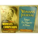 A pair of tinplate advertising signs for 'Woman's Journal' and 'Woman's Companion', together with