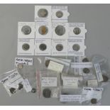 A mixed collection of over twenty-five post medieval coins and tokens, to include a Elizabeth I