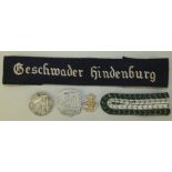 A WWII German Luftwaffe arm title "Greschwader Hindenburg", a single wermadit epaulette, a
