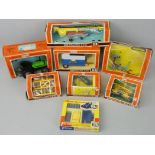 Britains - eight boxed agricultural die-cast vehicles, to include No. 9533 Post Hole Digger, No.