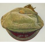 A school sports cap with tassle, marked W&H Rugby Football Union for 1928- 29 supplied by