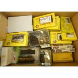 Two boxes of assorted railway related kits and accessories, to include Ratio Plastic Models kits,