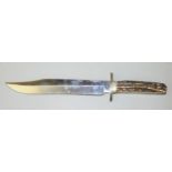 An antler handled saw-edged Bowie knife by F. W. James of Sheffield, 26.5cm blade, 40cm overall.