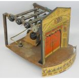 A tinplate Benjamin Pollock's Theatre, together with Pollocks Theatre booklet, scenes and