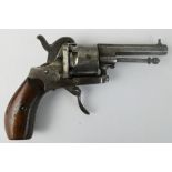 A 7-5mm pin fire six shot revolver, having a 7cm octagonal barrel, wooden grips and marked ELG to