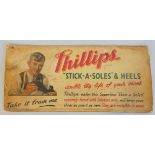 An advertising sign for Phillips "Stick-A-Soles" and Heels, "double the life of your shoes, Phillips