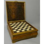 A unique entirely handmade and carved chess set in marquetry cabinet, the hardwood storage cabinet