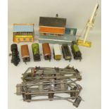 A quantity of railway related items including Three 'O' gauge locos, together with carriages,