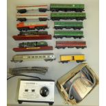 Two boxes of railway locomotives and carriages, together with a quantity of loose track, several