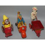 A Technofix (Western Germany) tinplate scooter with rider and woman passenger, together with a Marx
