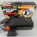 A boxed Sinclair ZX Spectrum +2 'James Bond 007 Action Pack' computer, with light gun, power supply,