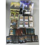 A collection of Harry Potter albums and cards, new old stock collector cards, miscellaneous loose