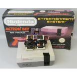 A boxed Nintendo Entertainment System (NES) Action Set, with control deck, two controllers