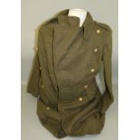 British Army khaki greatcoat with KC general service buttons, marked size 16 and dated 1952.