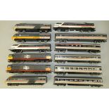 Twelve railway coaches and locomotives, to include mostly Hornby Intercity locomotives and